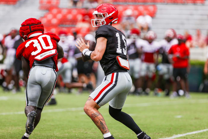 Georgia quarterback Carson Beck throws a pass during one of Georgia's fall scrimmages inside Sanford Stadium. Following Georgia's second scrimmage, Beck was named the Bulldogs' starter.